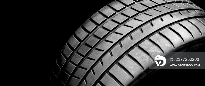 New wheel tire close-up on black