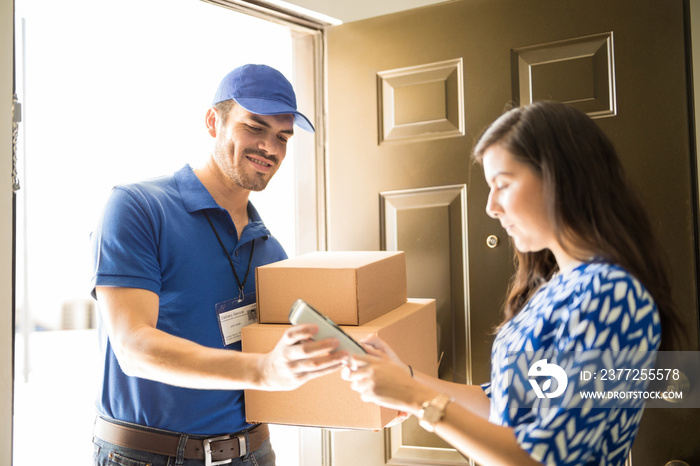 Delivery man using technology