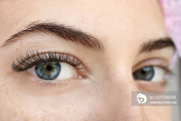 Young woman with eyelash extensions, closeup