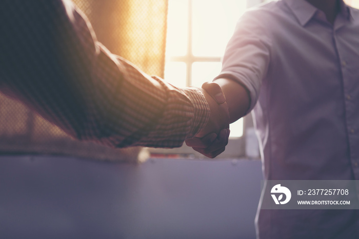 Business people shaking hands, finishing up a meeting