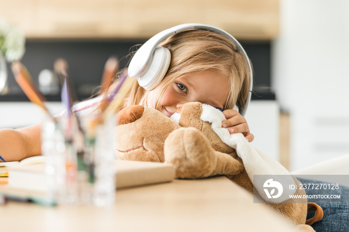 Cute child with toy dog stock photo