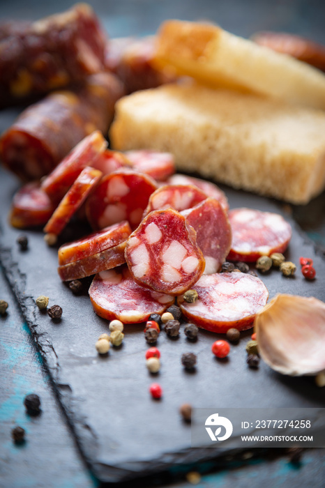 Slices of cured meat sausage