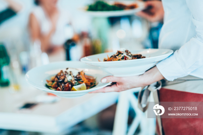 Serving food in restaurant