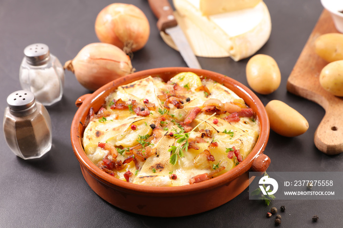 baked potato, bacon and cheese- french traditional tartiflette