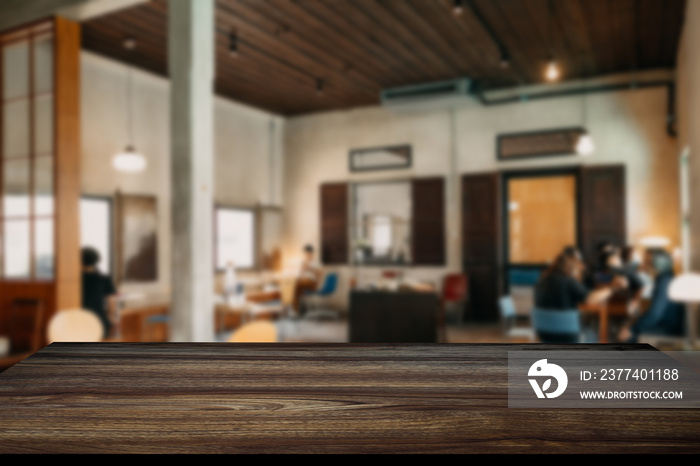 Empty top of wooden shelves on coffee shop ,tree front view background. For product display blur bac