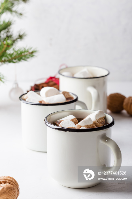 Hot chocolate, cocoa  on the festive white wooden table