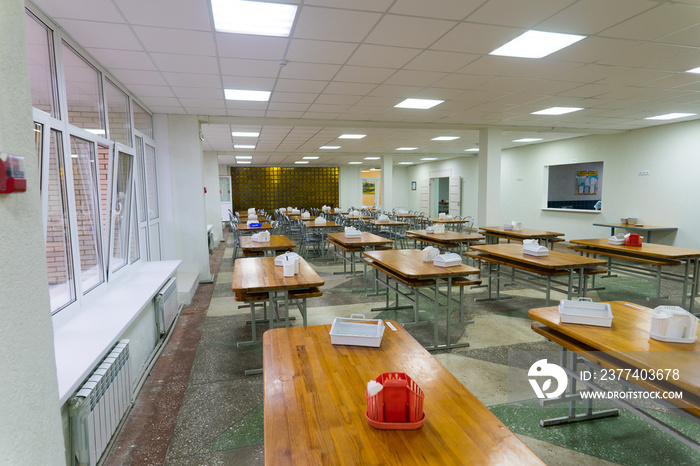 Chairs and tables. The dining hall in school is quarantined, isolation.