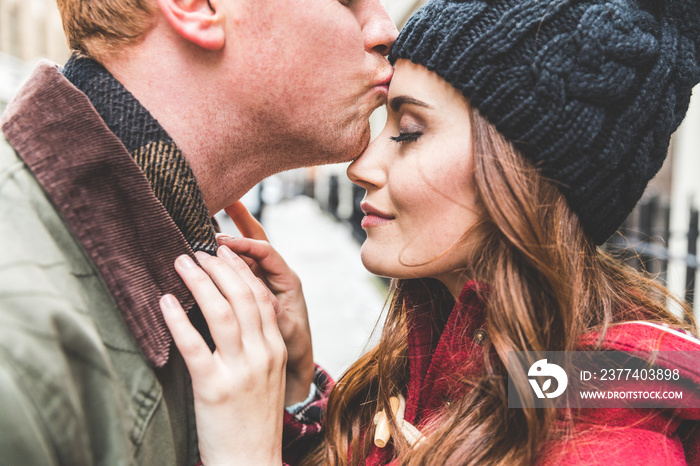 Intimate couple moment kissing and being together