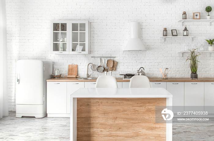 Modern stylish Scandinavian kitchen interior with kitchen accessories.