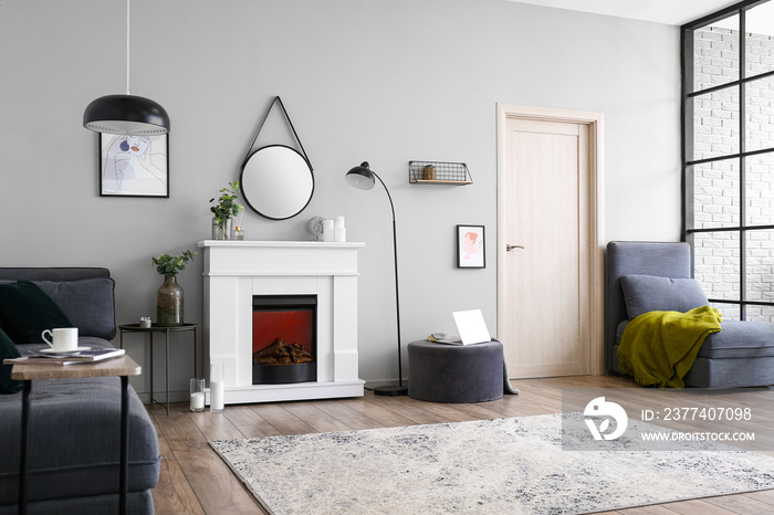 Interior of stylish living room with fireplace