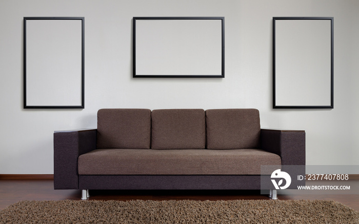 Modern couch with wall decoration frames