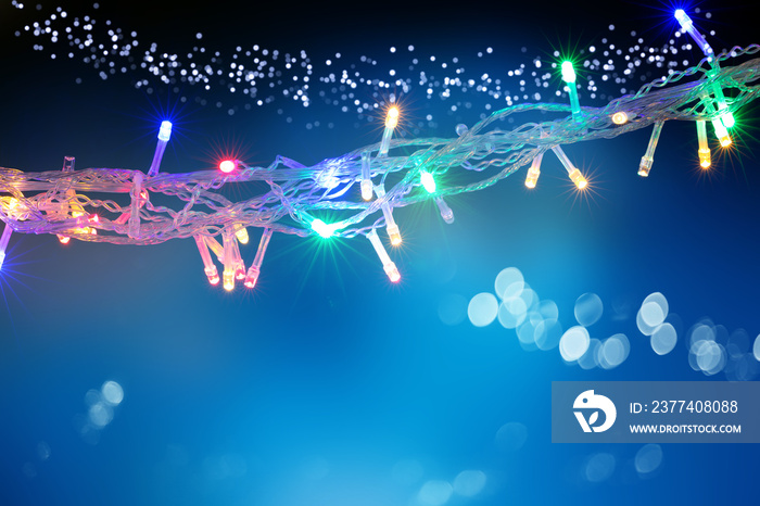 Beautiful background with Christmas light garland with copy space. Holidays concept.