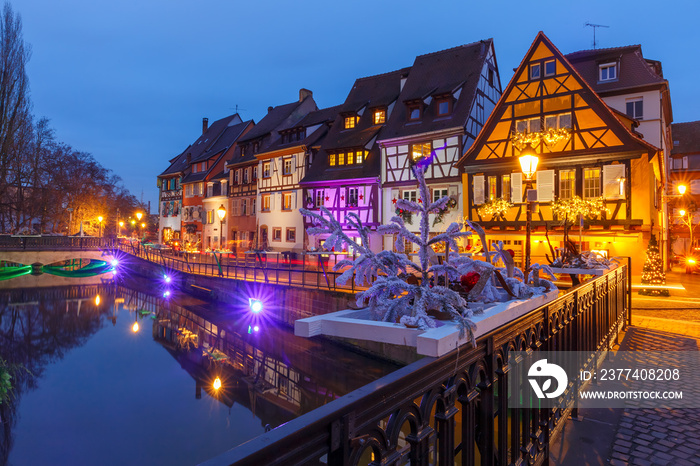 Traditional Alsatian half-timbered houses on the channel in Petite Venise, old town of Colmar, decor