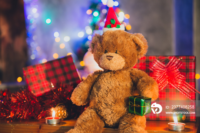 Teddy bear doll wear christmas hat decorate for christmas background