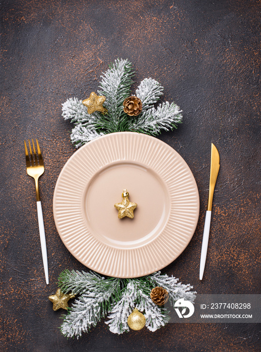 Christmas table setting and golden decor