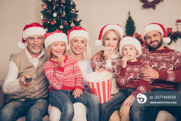 Multi generation, happiness, friendship. Group of cheerful relatives bonding on couch, excited, mom,