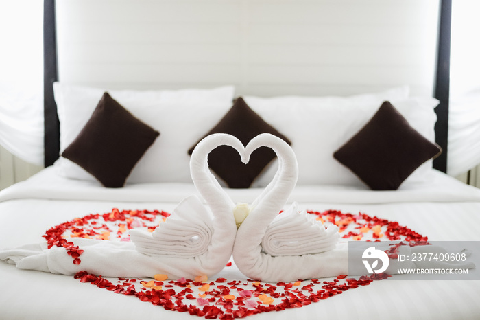 Wedding bed with fold a towel swan