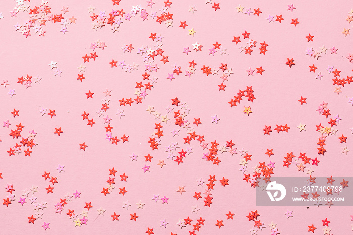 Shining pink stars on pink pastel background with copy space for your text. Party banner template.