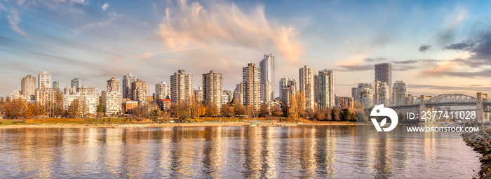 Panoramic View of Modern Downtown Cityscape. Sunset Sky Art Render. Beach in False Creek, Vancouver, British Columbia, Canada.