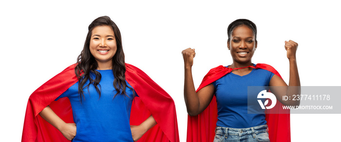 women’s power and people concept - happy women in red superhero capes over white background