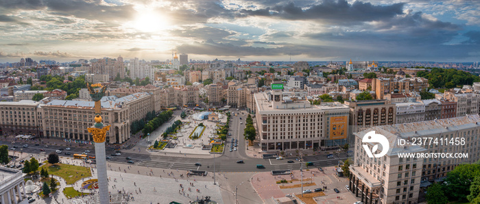 Aerial view of the Kyiv Ukraine above Maidan Nezalezhnosti Independence Monument. Golden beautiful Ukrainian woman statue in the middle of the city.