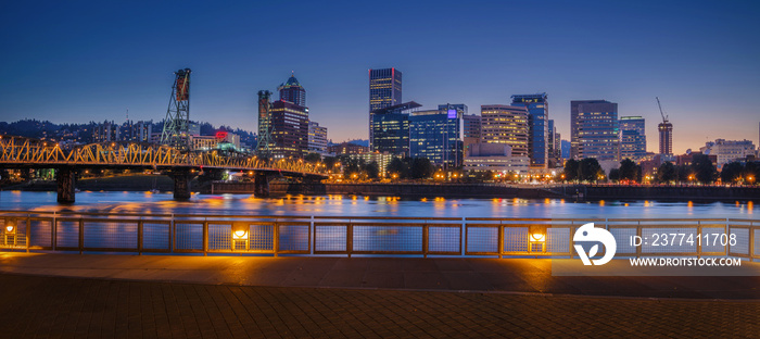 Portland early night with Willamette River and Hawthorne bridge, with wonderful yellow city lights, Oregon, USA