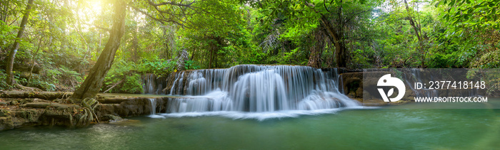 Panoramic beautiful deep forest waterfall