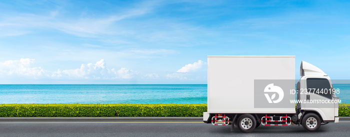 The semi-truck for seafood delivery Driving on the beach road Fast and eco-friendly freight forwarding concept.