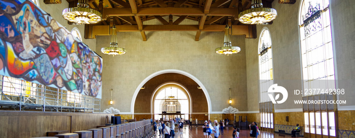 Famous Los Angeles sightseeing city skyline landmark Union train station in Art Deco and spanish Colonial architecture style breathtaking interiors and palm tree courtyard gardens with columns archway