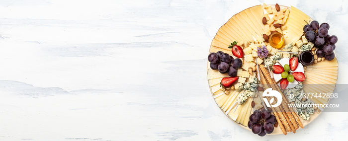 Antipasto platter, Antipasto Cheese board of various types of soft and hard cheese. spanish manchego cheese, aperitivo party concept, banner, menu, recipe place for text