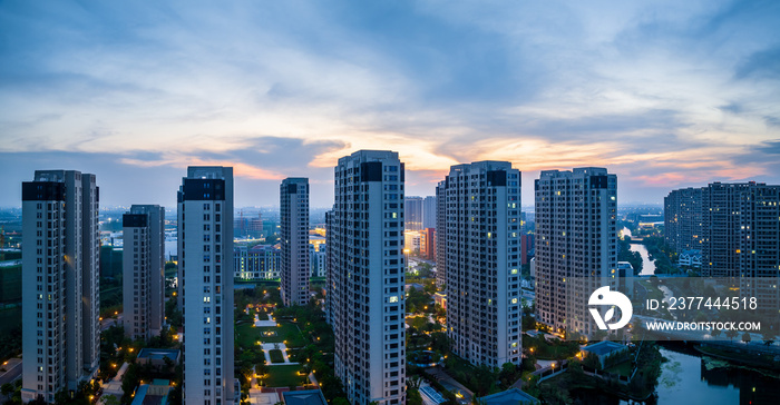 Aerial view of urban buildings residential area scenery in Jiaxing, China, Asia. Beautiful cityscape at sunset.