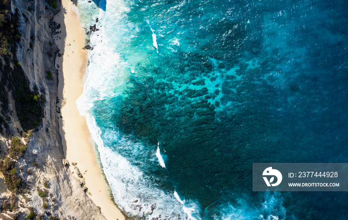 Top Down Aerial Shot Of Diamond Beach Thousand Islands at Nusa Penida, Bali - Indonesia