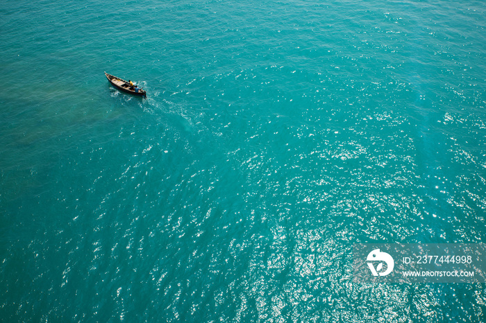 Lonely boat in a sea from Top view at Rameswaram, Tamilnadu India.