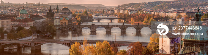 Prague panorama with bridges on river Vltava at early autumn mor