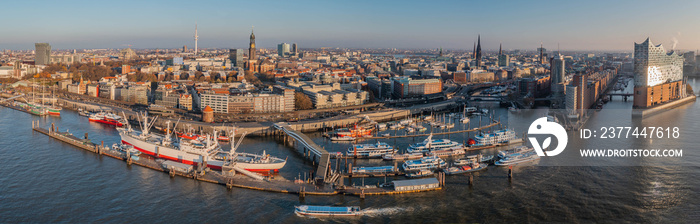 Panorama aerial view of the harbor, St. Michael’s Church (German: St. Michaelis) and downtown Hamburg, Germany. Panorama aerial view of Elbphilharmonie, Hafencity und St. Pauli (Landungsbrücken).