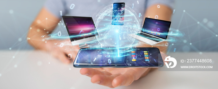 Modern devices connected in businessman hand 3D rendering