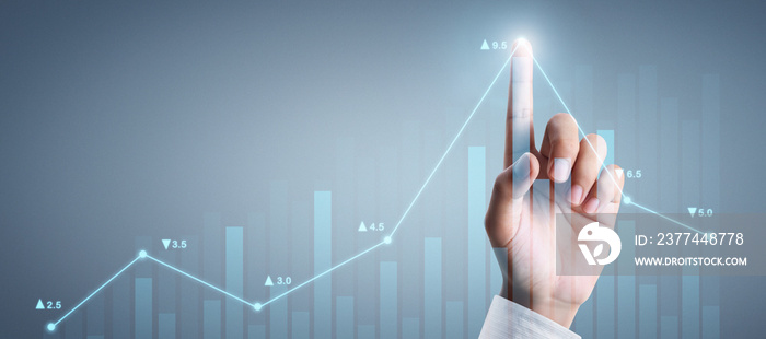 Businessman plan graph growth and increase of chart positive indicators in his business