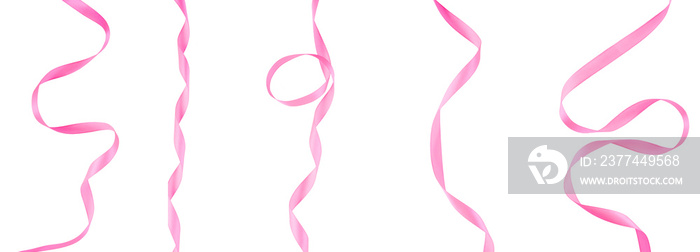 Lots of pink ribbons on a white, isolated background. Top view.