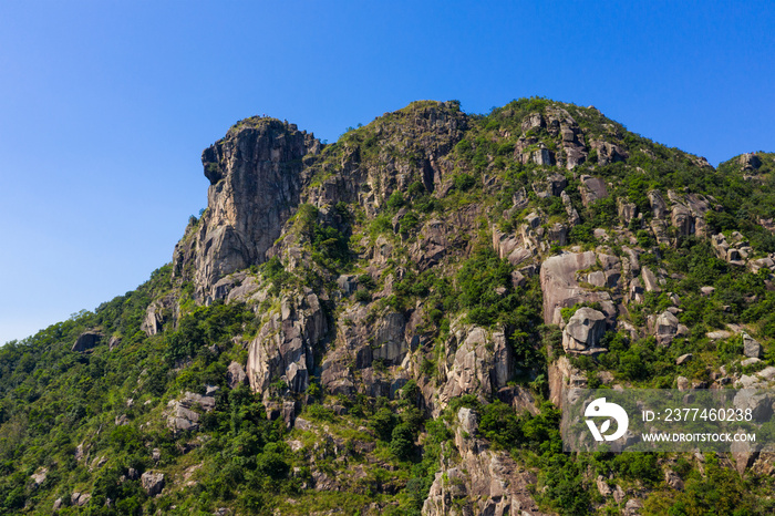 Drone fly over Hong Kong lion rock mountain