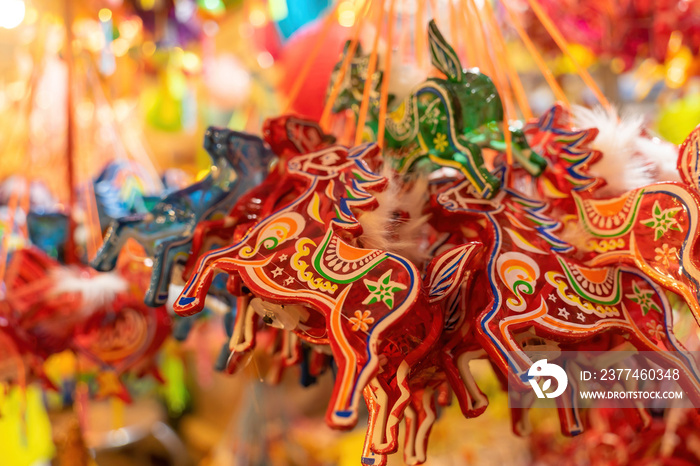 Decorated colorful lanterns hanging on a stand in the streets of Cholon in Ho Chi Minh City (Saigon), Vietnam during Mid Autumn Festival of Lunar Calendar.