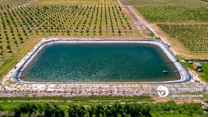 Aerial view of a water tank (pool) for irrigation in agriculture.