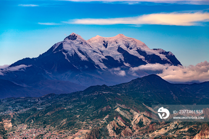 Bolivia. La Paz, national capital of Bolivia. Suburbia of the city and Illimani (the highest mountain in the Cordillera Real) seen from El Alto