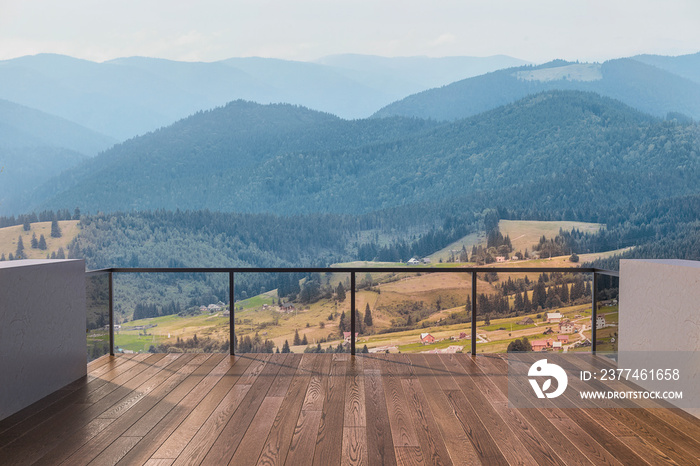 Balcony view of  mountains. Landscape. Sunny Day. Terrace with a beautiful view.