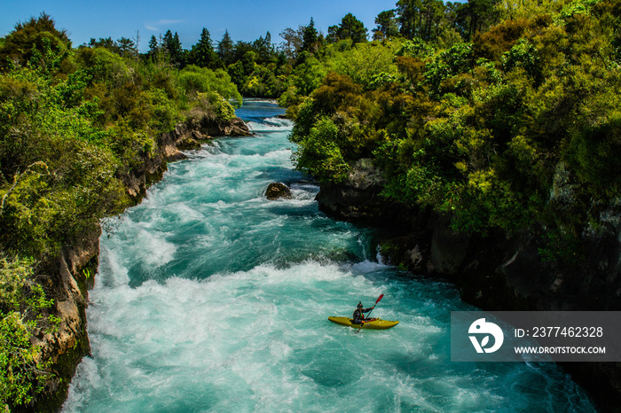 Scenic landscape view of turquoise water of Waikato river and Huka Falls,most popular natural tourist attraction/destination. Great lake Taupo,North Island, New Zealand. Summer active holiday concept.