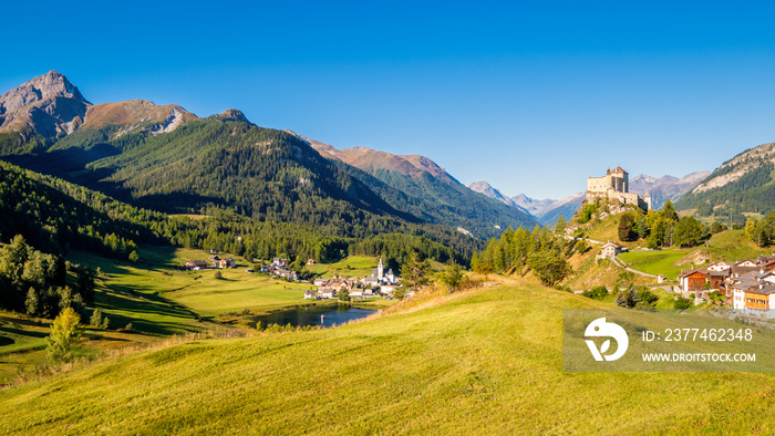 Mountains surrounding the village and castle of Tarasp (Grisons, Switzerland). It lies in the Lower Engadine Valley along the Inn River near Scuol. Tarasp Castle was built in the 11th century.