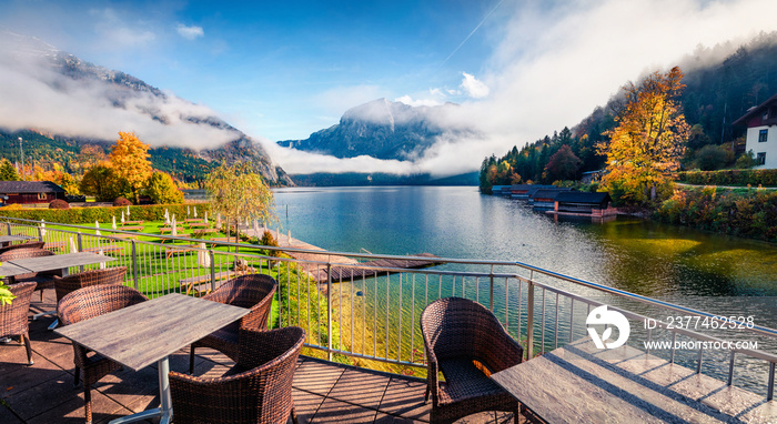 Gorgeous autumn scene of Altausseer See lake. Great morning from coze resting place in Altaussee village, district of Liezen in Styria, Austria. Beauty of countryside concept background.