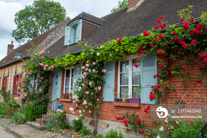 One of most beautiful french villages, Gerberoy - small historical village with half-timbered houses and colorful roses flowers, France