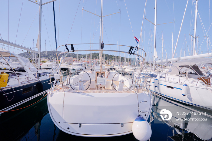 Luxury traveling. Sailing the sea. Stern of modern yacht.