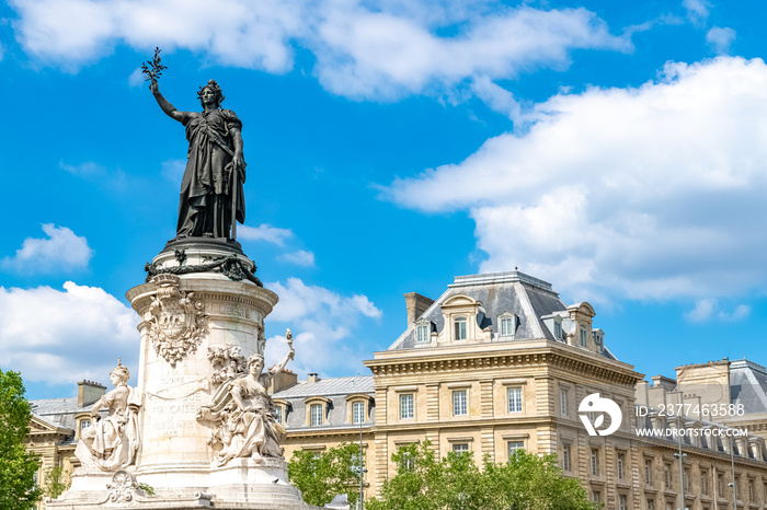 Paris, the beautiful Republic place, in the center, typical buildings in background