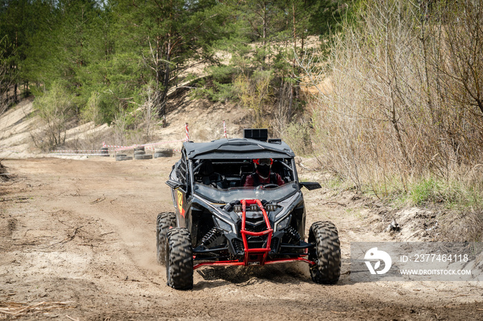 ATV, UTV hard driving over the mud off road